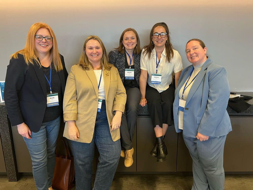Panelists on the "Harnessing the Power of Grassroots Ecosystems to Accelerate Climate Action" panel discussion pose for a photo at the Midwest Climate Collaborative Summit.